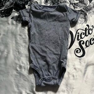 Carter’s navy blue and white striped baby onesie